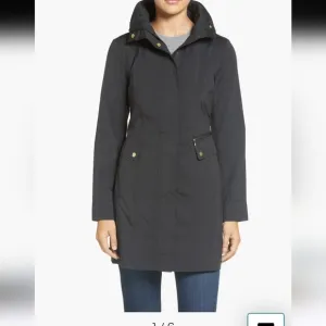 Cole Haan back bow pqckablr black rain jacket XXS raincoat