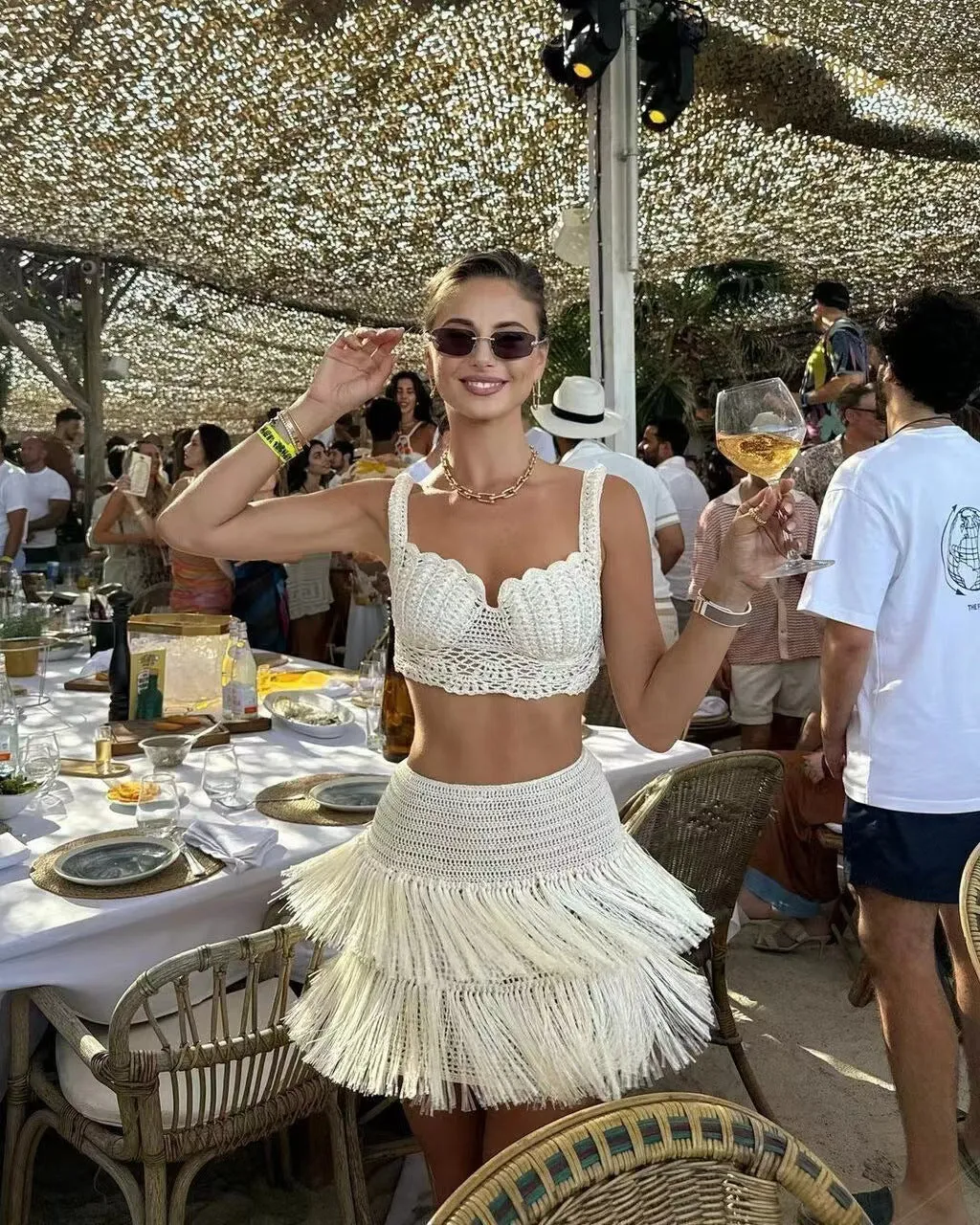 Elegant Summer Tassel-Trimmed Crochet Top and Flirty Mini Skirt Two-Piece Set