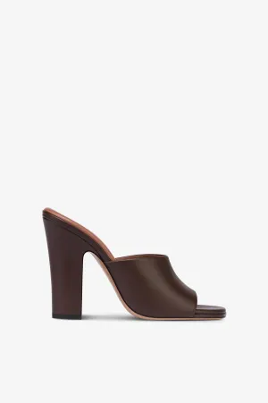 Mules in ebony leather