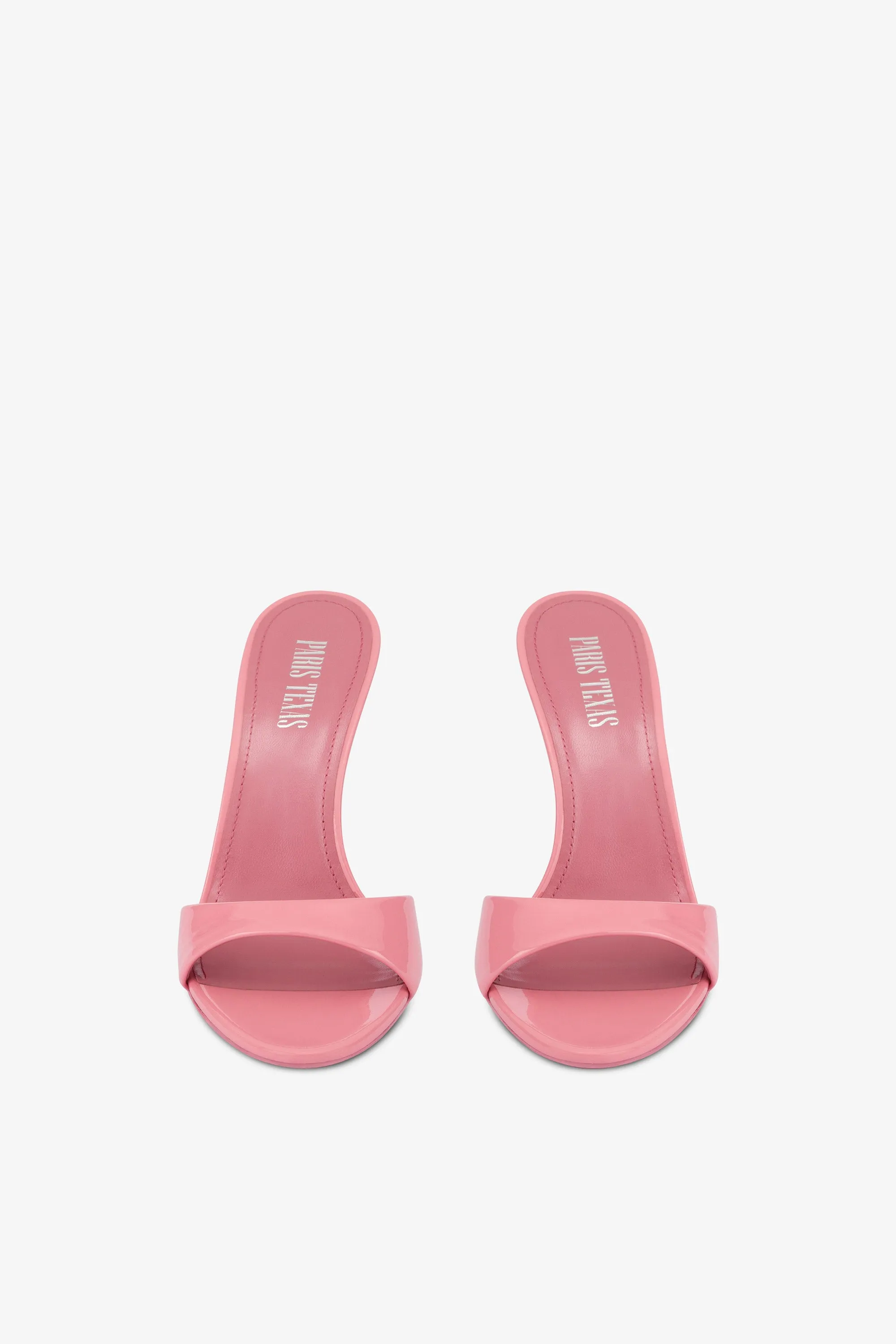 Mules in pink patent leather