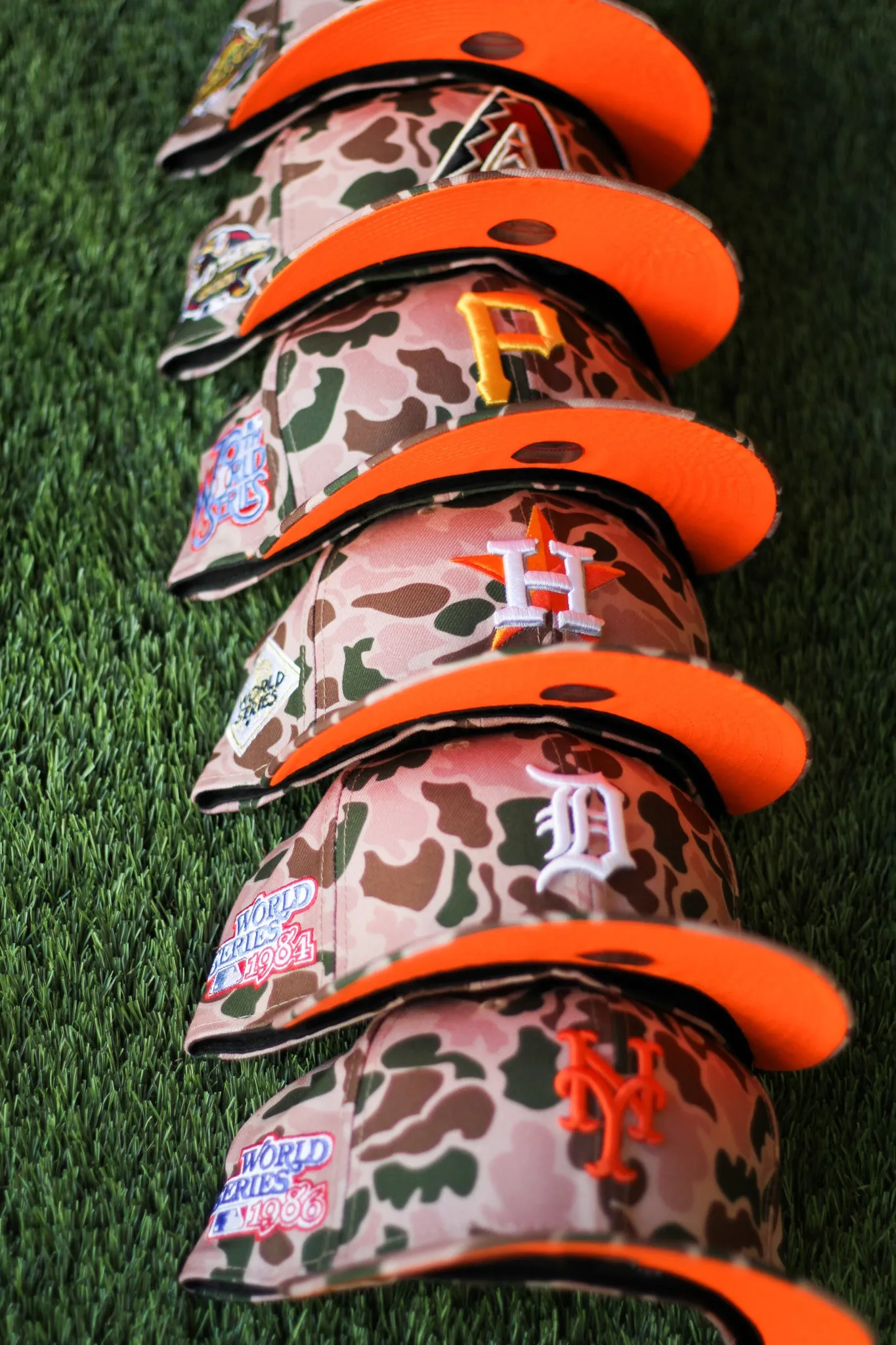 PITTSBURGH PIRATES DUCK CAMO FITTED W/ ORANGE UNDER VISOR